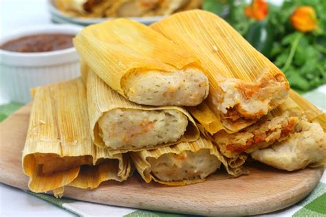 Delicious tamales - Learn how to make tamales from scratch with a zesty rojos de pollo filling. These Mexican specialties are steamed in corn husks and filled with slow-braised chicken in a red sauce.
